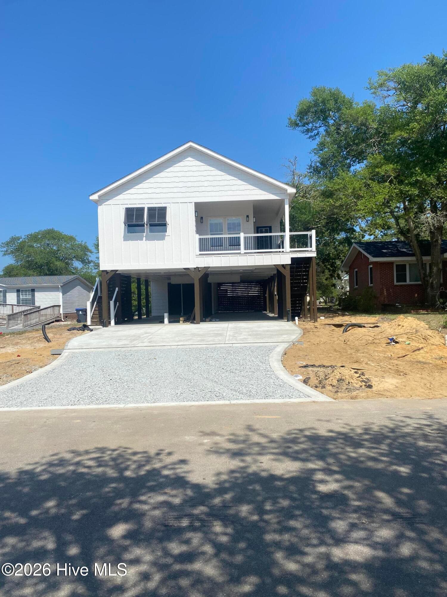 Single Family Residence at 112 NE 65th Street, Oak Island, NC 28465, photo 3 of 3