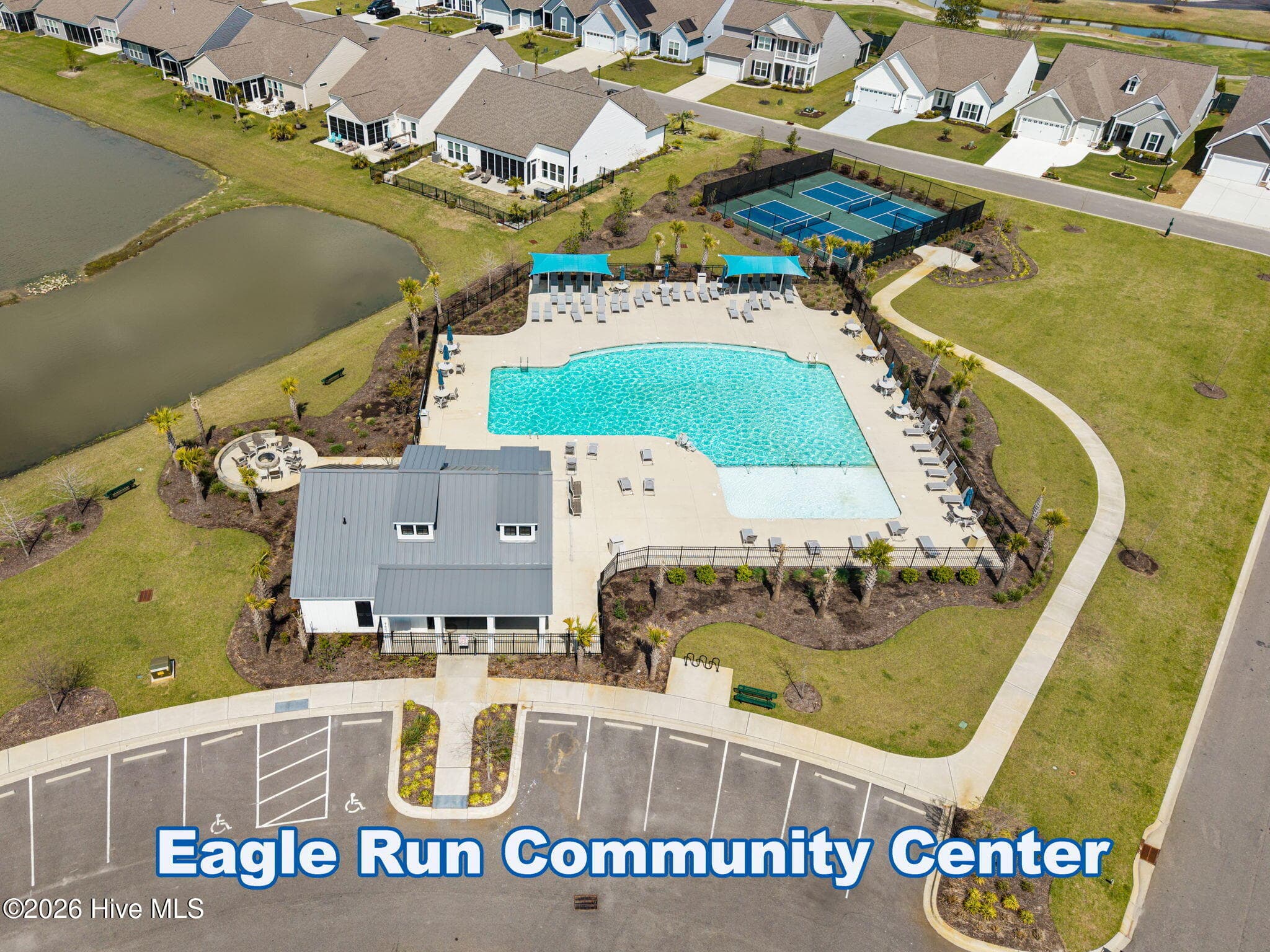 Eagle Run residents enjoy access to a community center, outdoor swimming pool, pickleball courts, and gathering spaces. - 139 Eagle Claw Drive, Calabash, NC 28467
