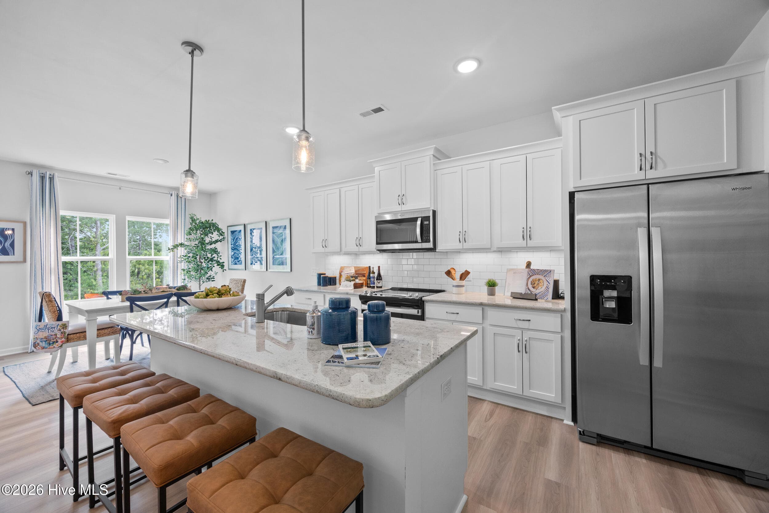 Home shown is a representation of the floor plan and may include optional features or upgrades. Elevations, materials, colors, finishes, square footage, and included features may vary from the actual home. Please consult a Sales Representative for complete details.
Public (Primary) - 629 Pelican Cove Way SE 247, Southport, NC 28461