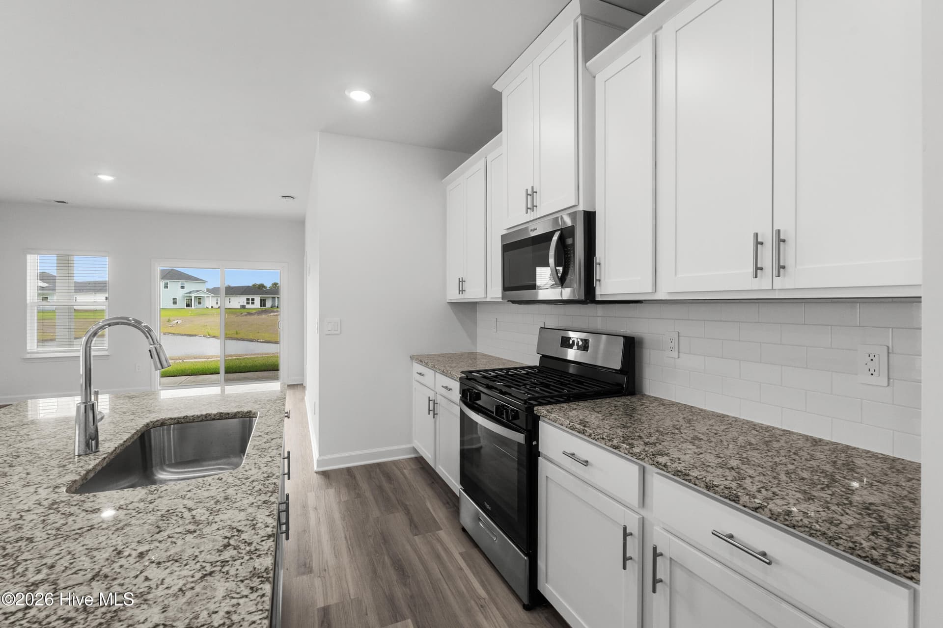 Photo is not of the actual home, but is an example photo of a completed home and may depict options and/or features that are not included - 2217 Lewis Allen Crossing NW, Ash, NC 28420