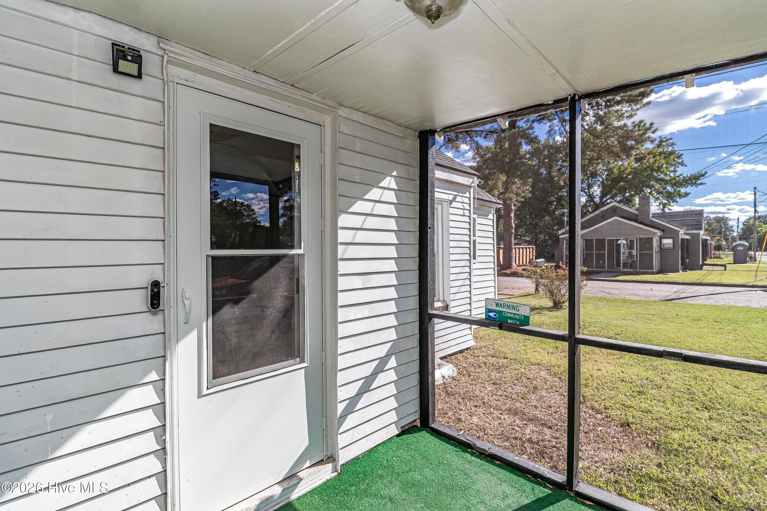 Inside screen porch. - 1601 Washington Street E, Wilson, NC 27893