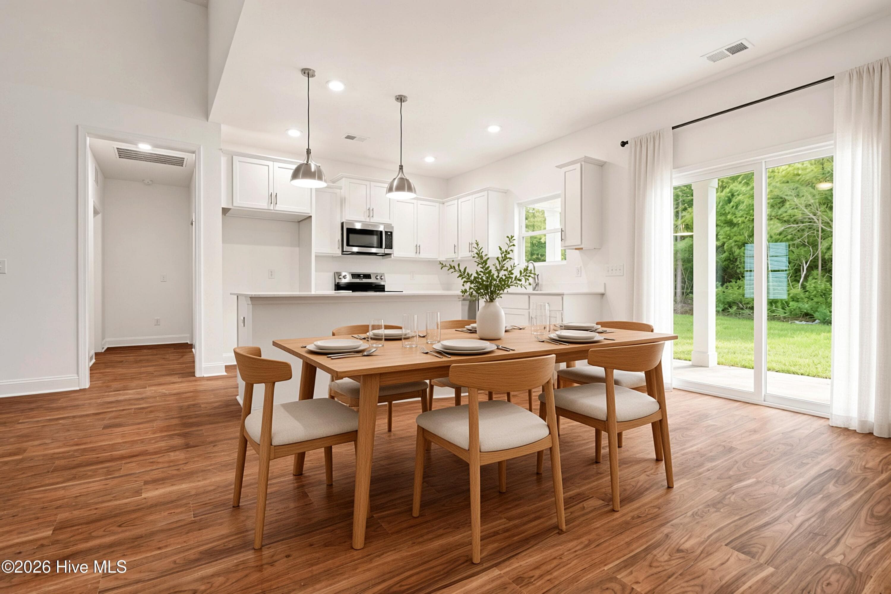 AI Staged Dining Room. - 2111 Cregan Cove SW (Lot 19), Ocean Isle Beach, NC 28469