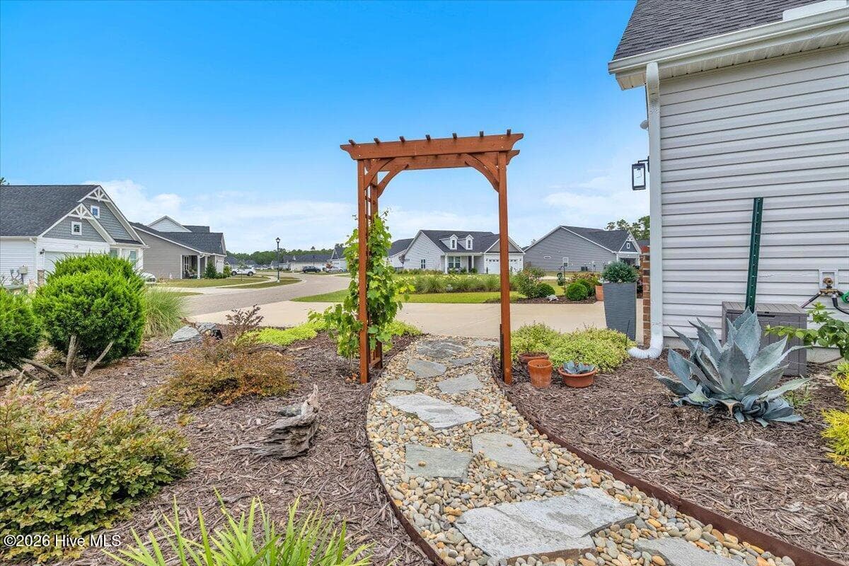 Single Family Residence at 1608 E New Carraway Place SE, Bolivia, NC 28422, photo 6 of 8