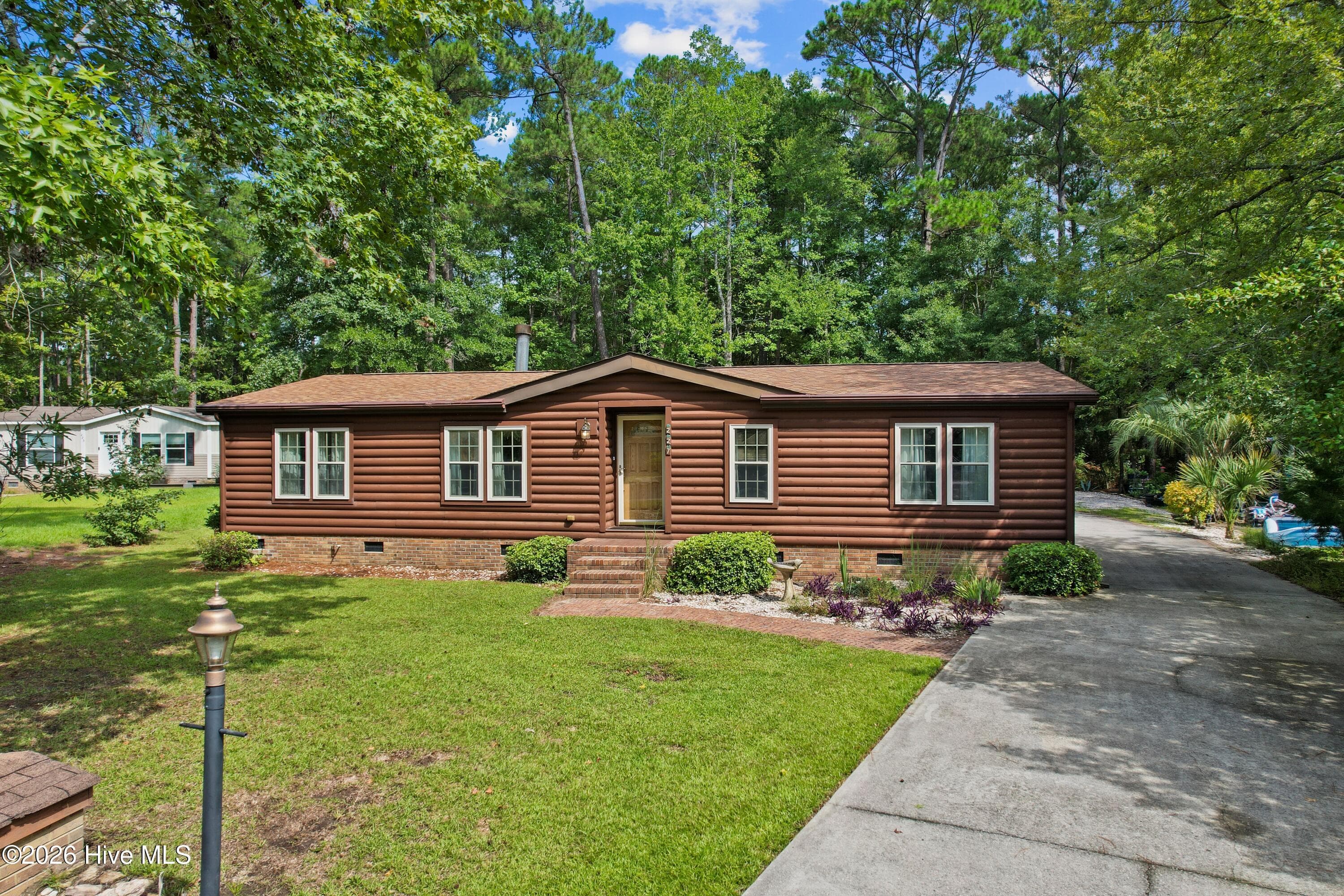 Front of Home (concrete driveway) - 227 Ocean Forest Drive NW, Calabash, NC 28467