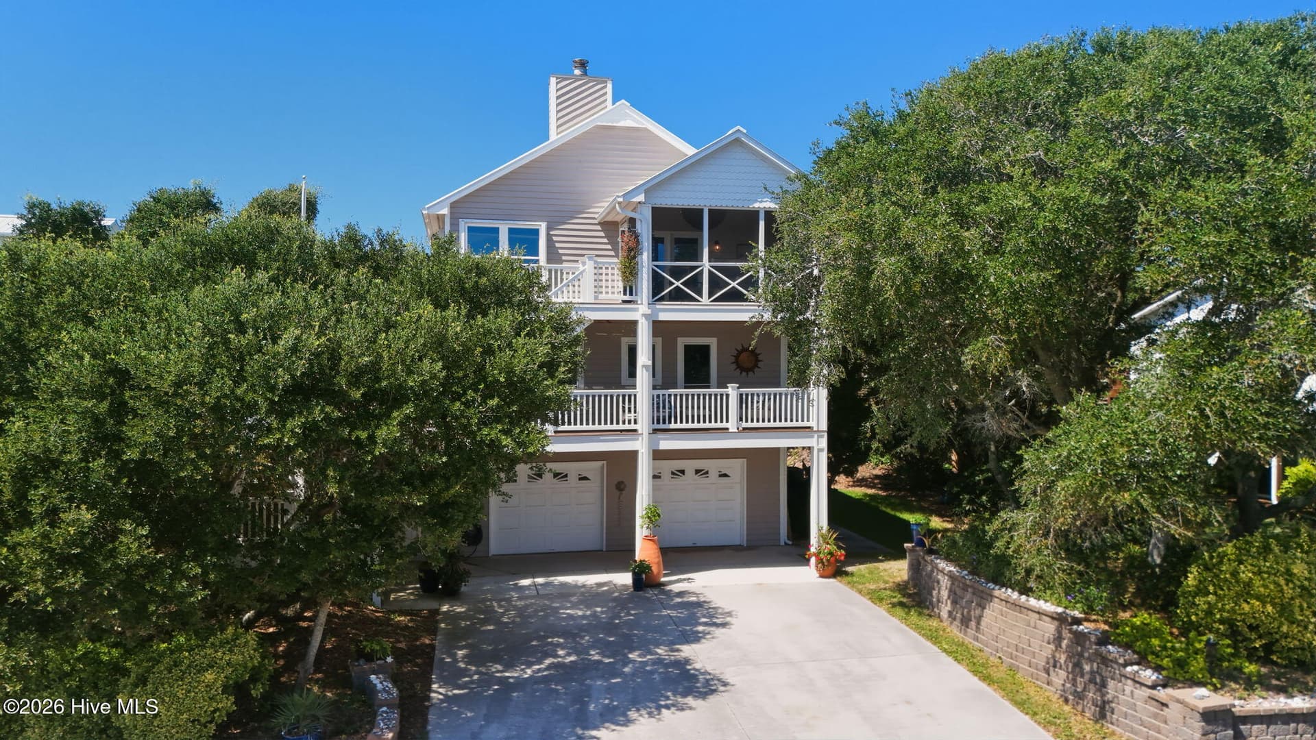 Coastal charm meets thoughtful renovations at 103 Georgia Street, with inviting outdoor living spaces and a prime island location. - 103 Georgia Street, Emerald Isle, NC 28594