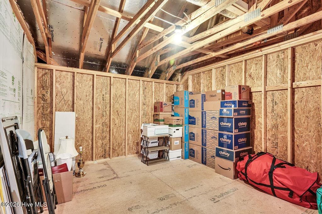 This incredible extensive, floored walk-out attic offers two large storage options! A 20X8 floored walk-out leads to a 14X13 area. Keep the storage or finish these for an added room. - 142 Rice Marsh Way, Wilmington, NC 28412