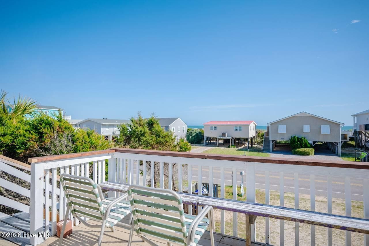 Single Family Residence at 3016 W Beach Drive, Oak Island, NC 28465, photo 2 of 2