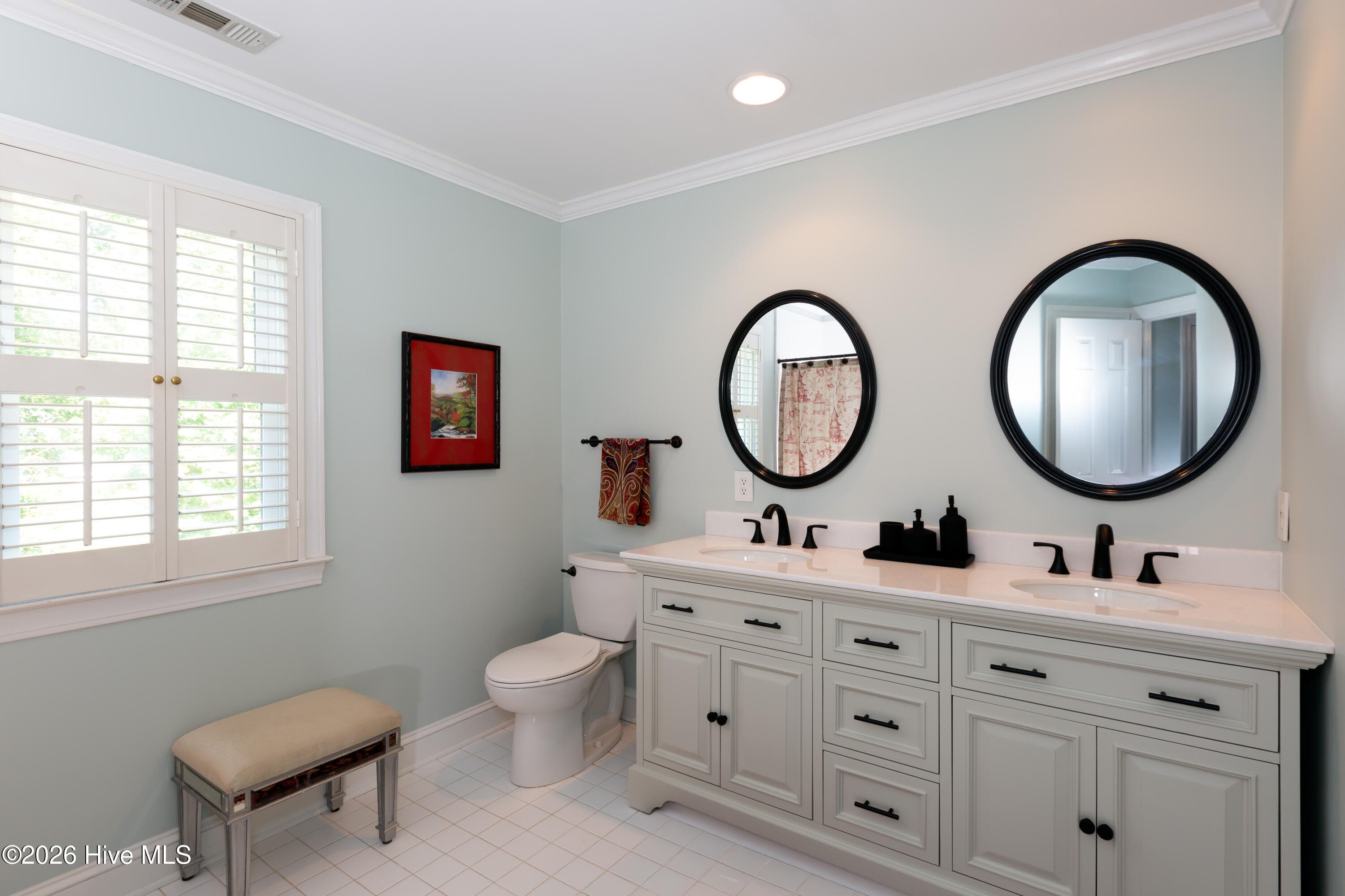 Primary bath with a beautiful new vanity - 2417 Oakview Drive, New Bern, NC 28562