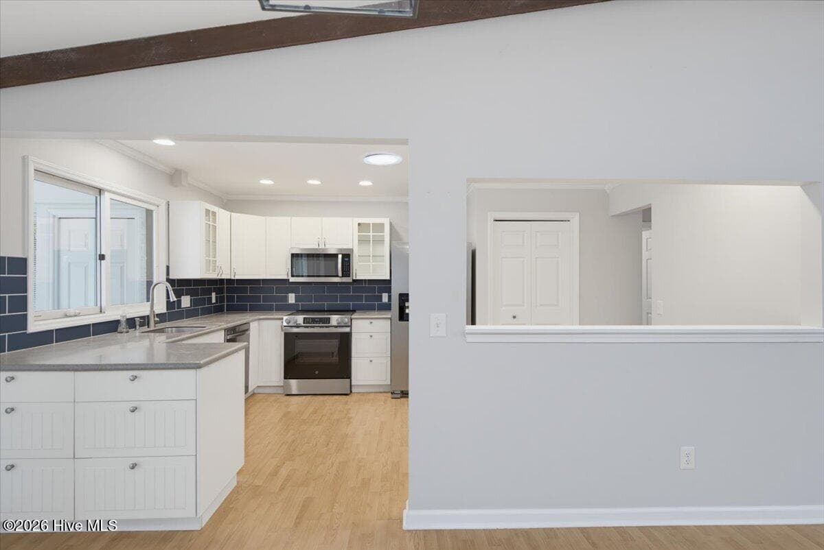 Kitchen with pass through - 55 Salem Drive, Pinehurst, NC 28374