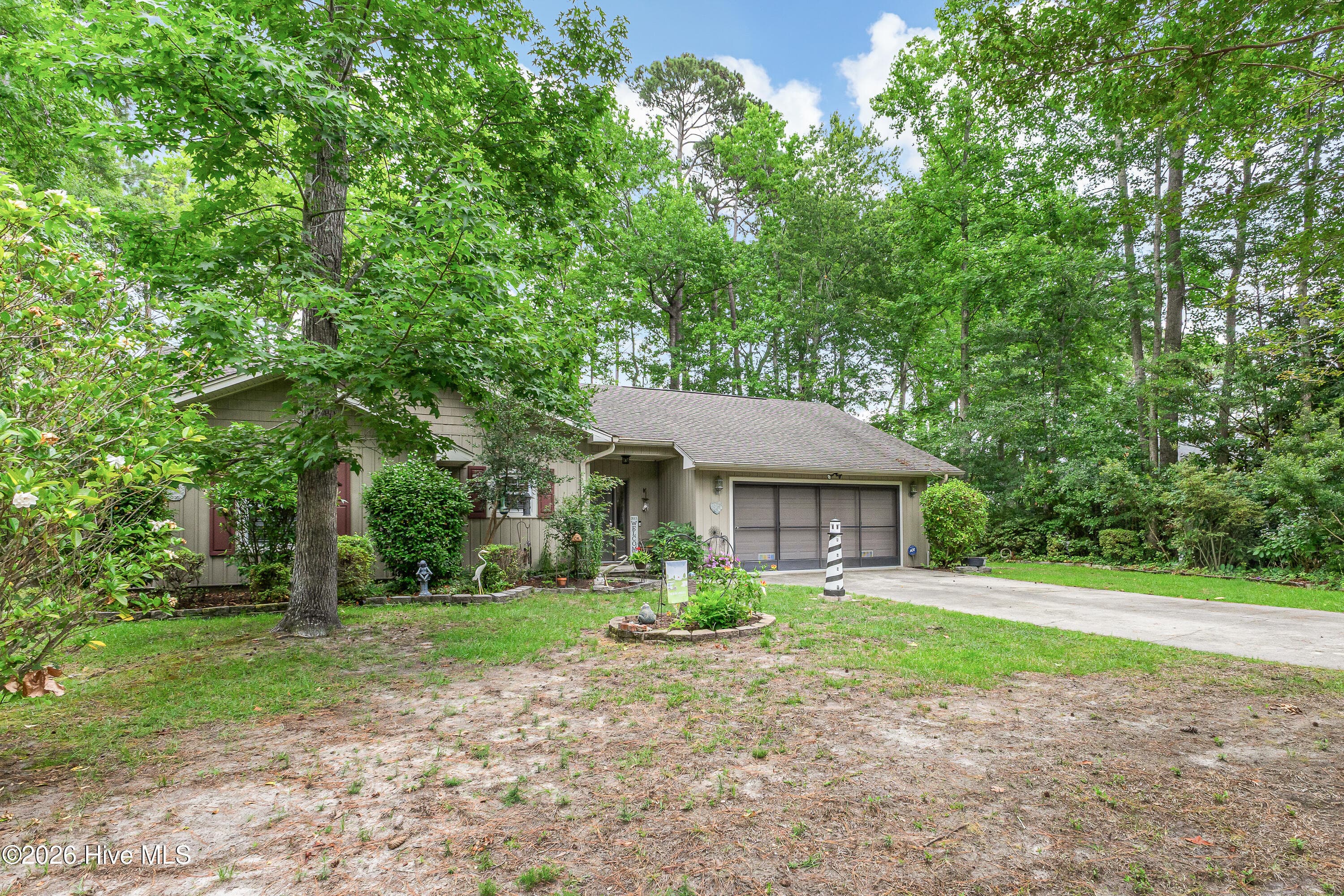 Single Family Residence at 5 Topsail Court, Carolina Shores, NC 28467, photo 2 of 46