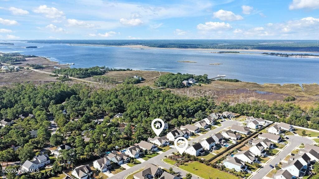 142 Rice Marsh Way - A well-appointed 3-Bed, 3-Bath 2,739 Sq Ft home with an enclosed 3-seasons room, extended patio and fully irrigated, beautifully landscaped yard. Close to the Cape Fear River, Carolina Beach, dining, shopping and entertainment, River Road Park, Veterans Park athletic complex, as well as walking and hiking trails, this home has it all! - 142 Rice Marsh Way, Wilmington, NC 28412