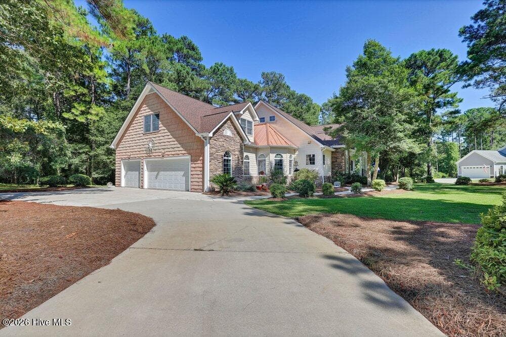 Single Family Residence at 107 S Grist Mill Road, Hampstead, NC 28443, photo 2 of 80