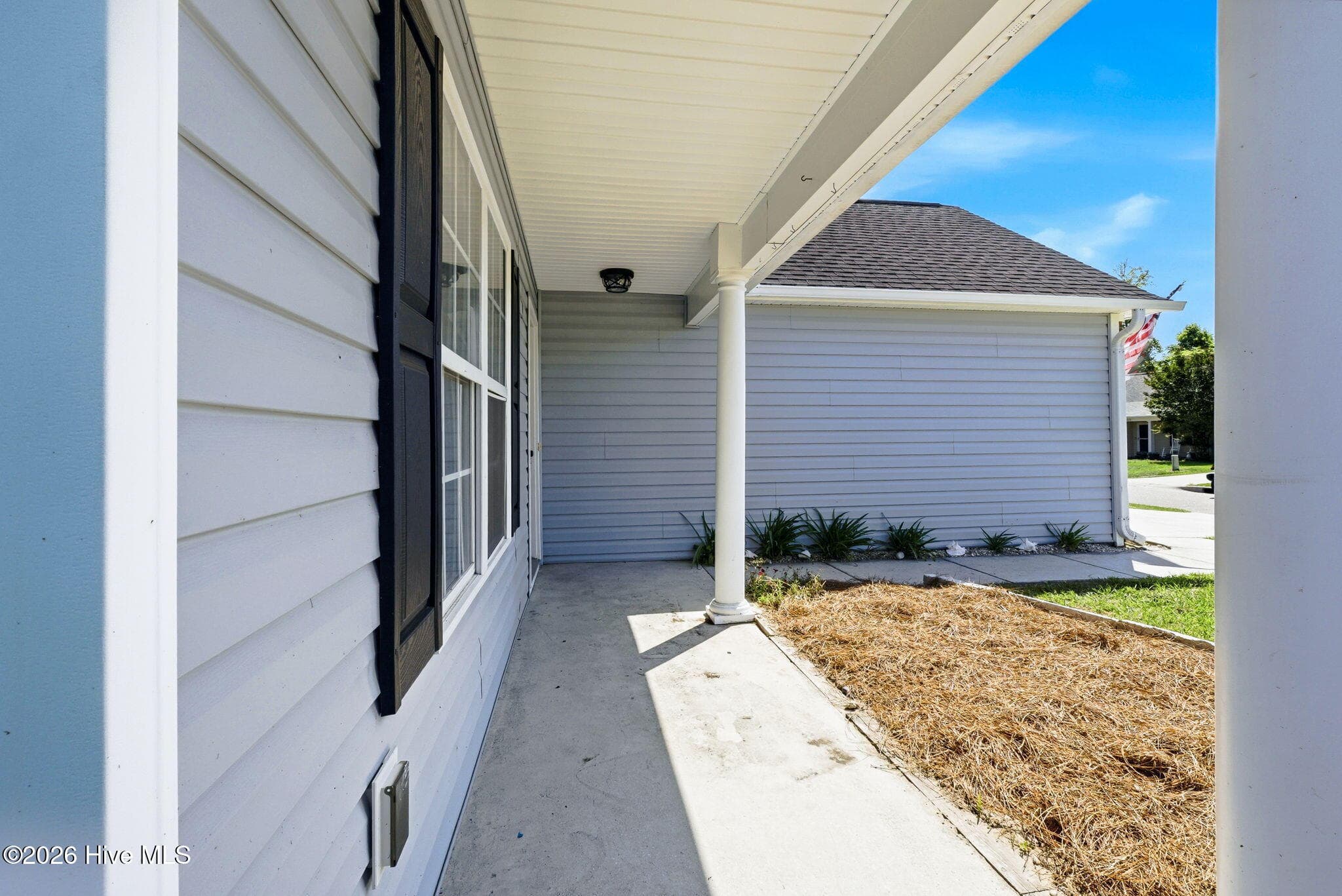 Front Covered Porch and Garage - 215 Gardenview Court NE, Leland, NC 28451