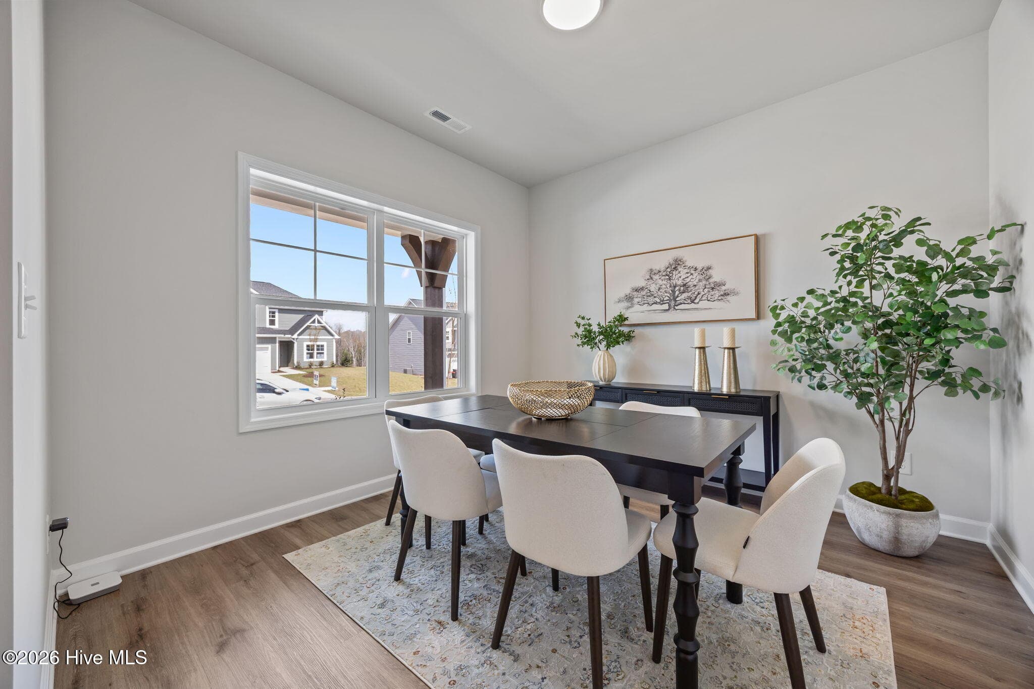 Example photo of similar home with staging. Actual home is under construction. - 4192 Workman Loop 90, Leland, NC 28451