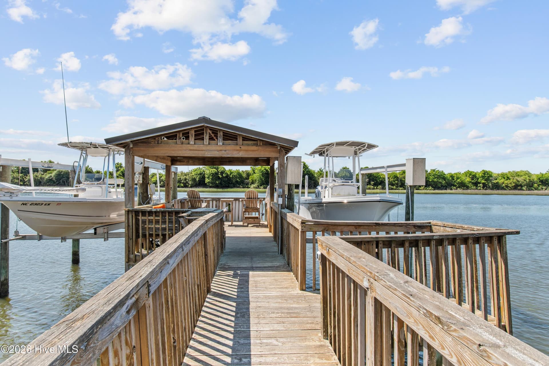 Pier with 2 boat lifts. - 2024 Camelot Drive SW, Ocean Isle Beach, NC 28469