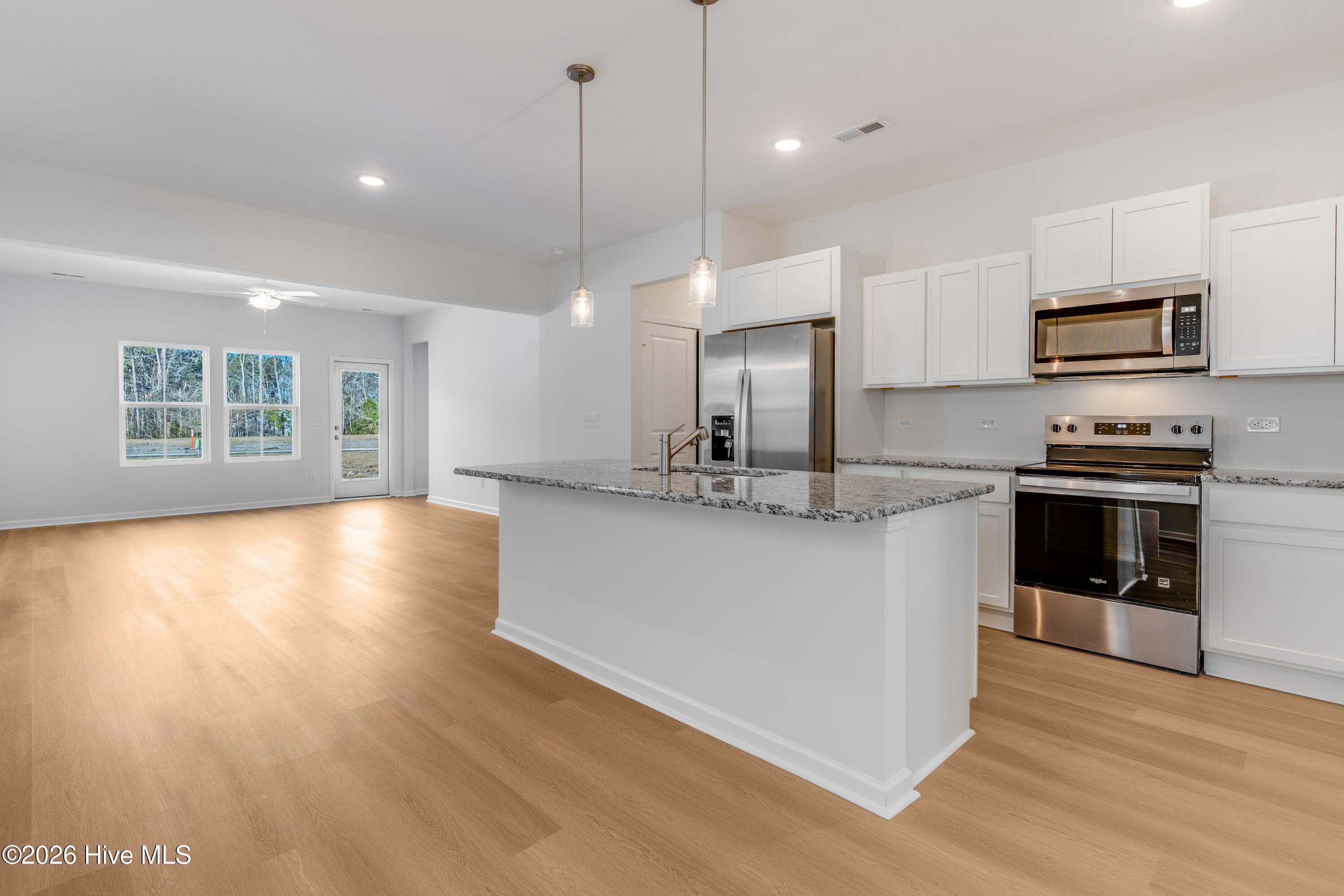 ''Home shown is a representation of the floor plan and may include optional features or upgrades. Elevations, materials, colors, finishes, square footage, and included features may vary from the actual home. Please consult the Community Sales Manager for complete details.'' - 189 Brookfield Branch Road 13, Hampstead, NC 28443