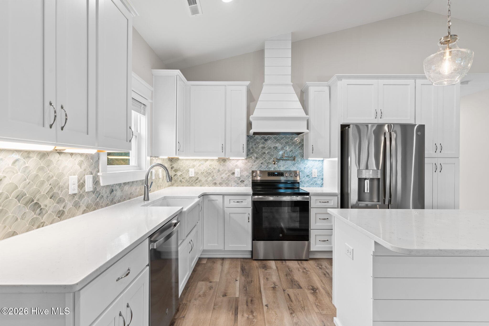 Photo is for illustrative purposes only of a similar home of same plan - 310 NE 58th Street, Oak Island, NC 28465