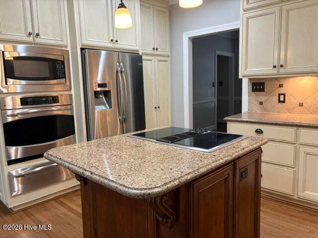 center island with room for a couple of barstools - 2207 Foxcroft Road NW, Wilson, NC 27896