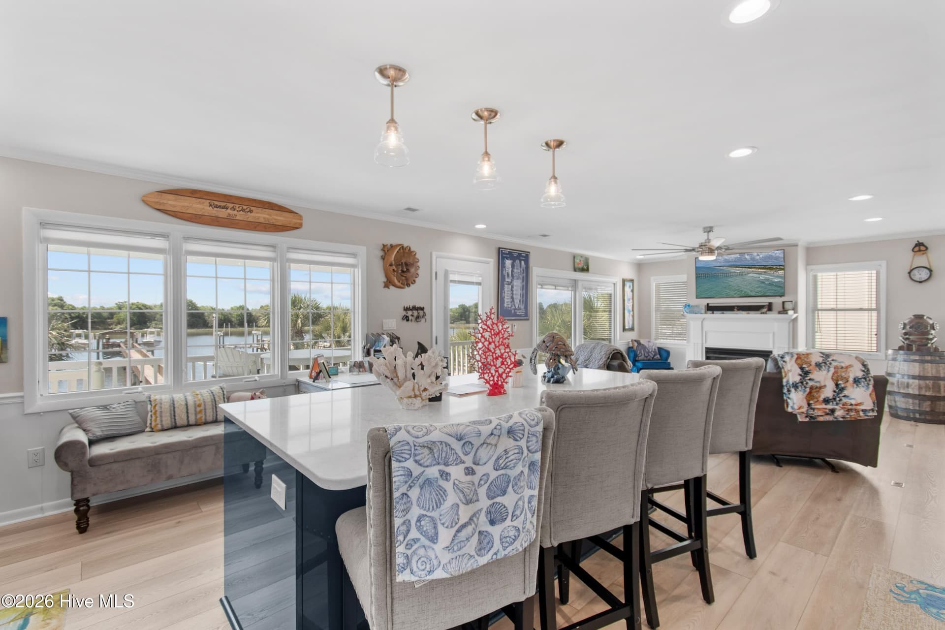 Kitchen is open to the living room allowing for easy coastal living. - 2024 Camelot Drive SW, Ocean Isle Beach, NC 28469