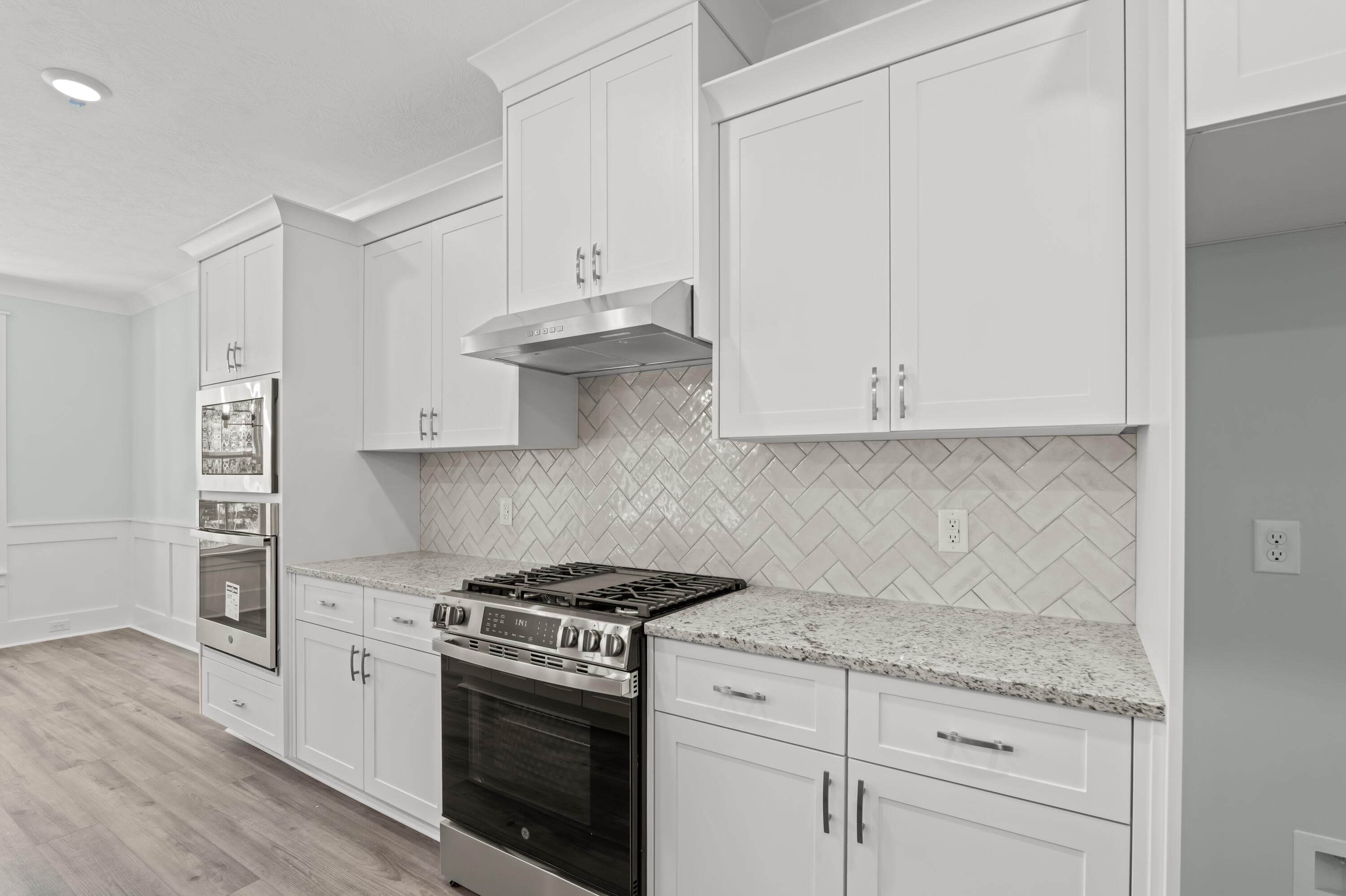 Gas range and herring bone backsplash - 1488 Bellingham Drive, Beech Island, SC 29842