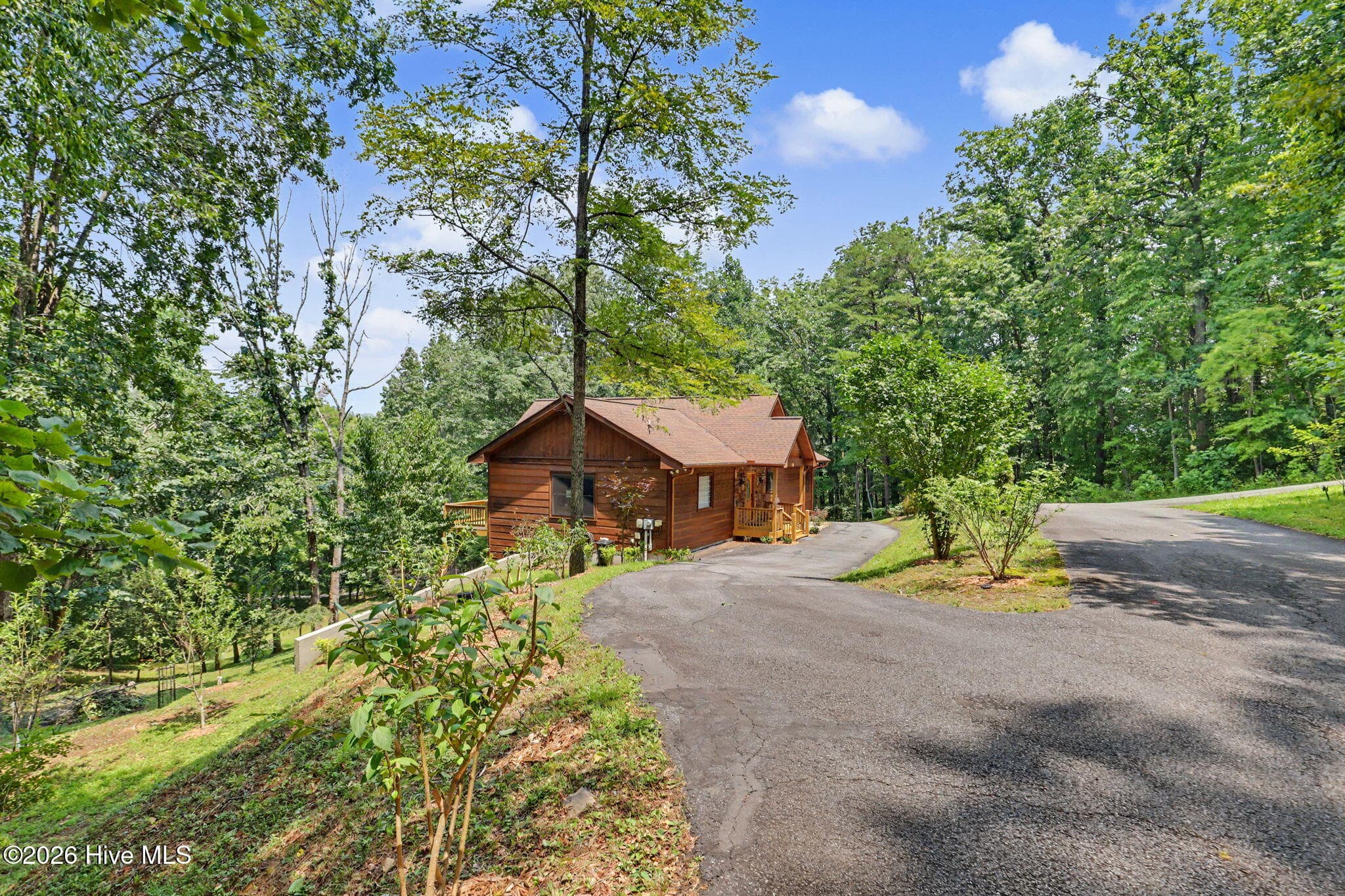 Private paved approach surrounded by mature hardwoods. - 210 Majestic Drive, Hayesville, NC 28904