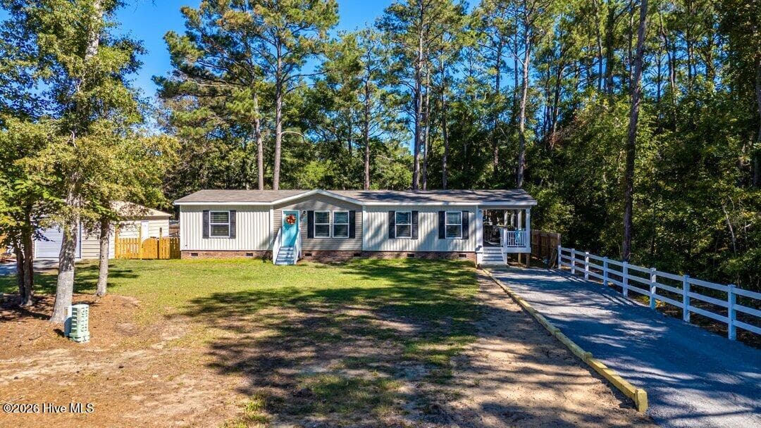 Manufactured Home at 3459 Lakeview Drive SW, Supply, NC 28462, photo 9 of 70