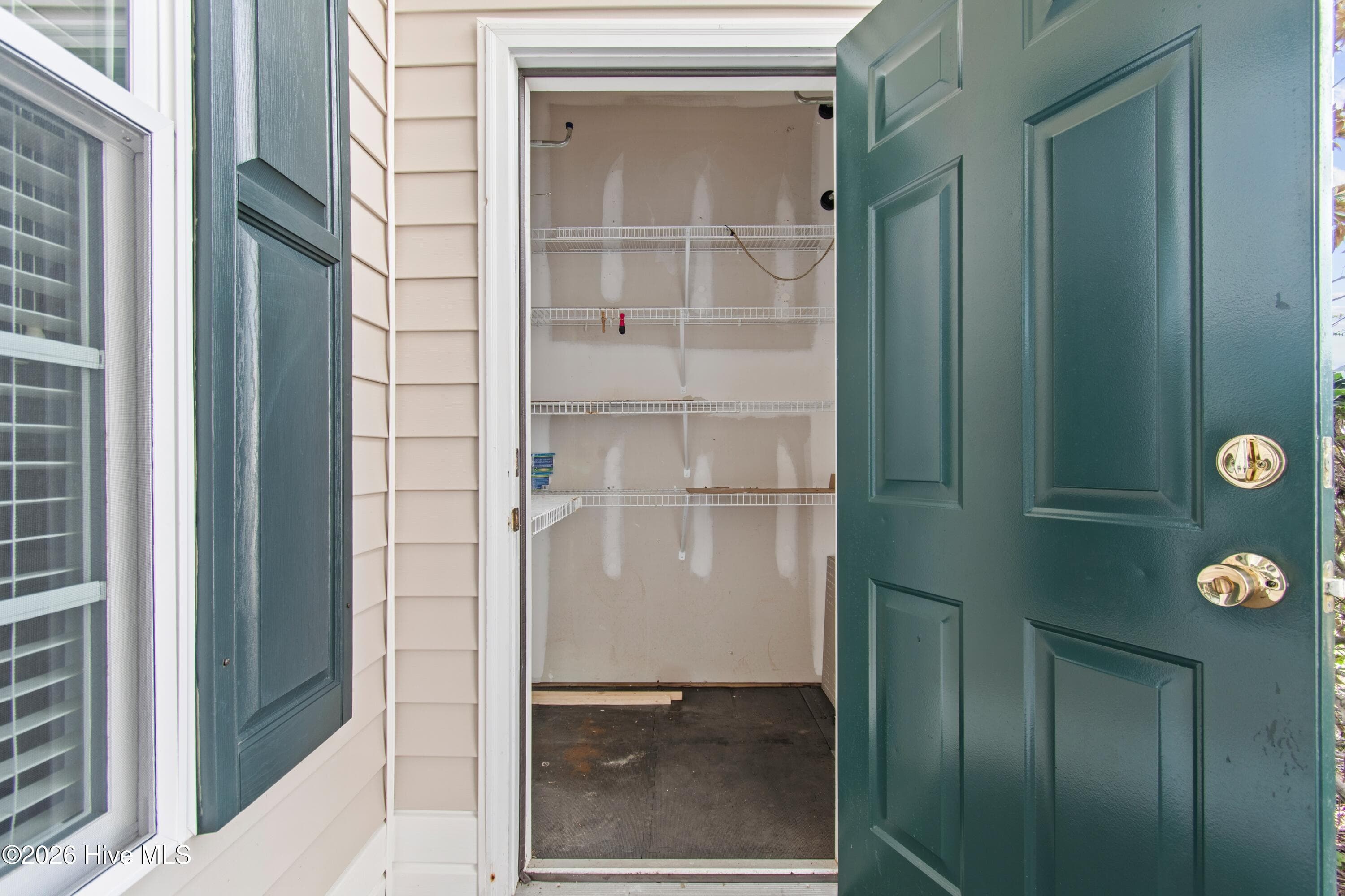 Storage closet for golf clubs and beach toys - 940 Great Egret Circle SW # 2, Sunset Beach, NC 28468