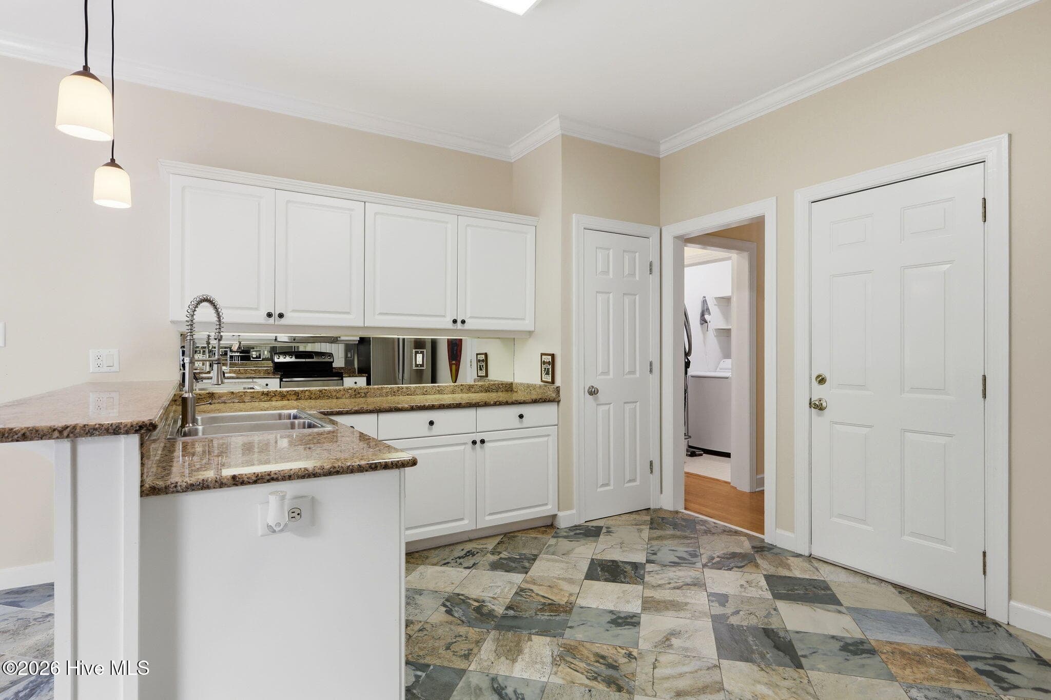 Kitchen and entry to laundry - 104 Talford Drive, Atlantic Beach, NC 28512
