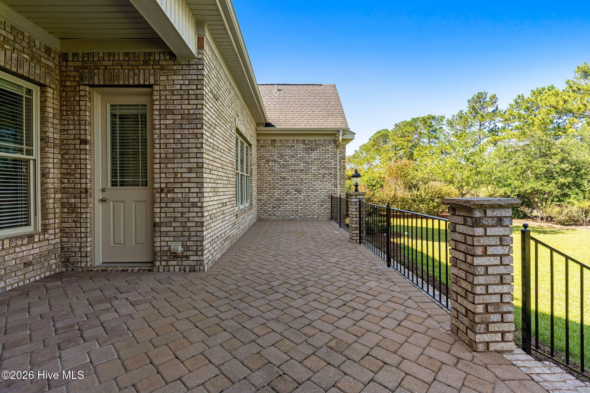 Owners Suite has a door to the back porch. - 9274 Oldfield Road NW, Calabash, NC 28467