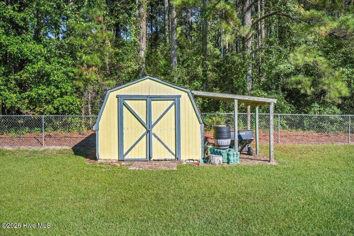 Storage shed and covered space - 110 Hilltop Drive, Four Oaks, NC 27524