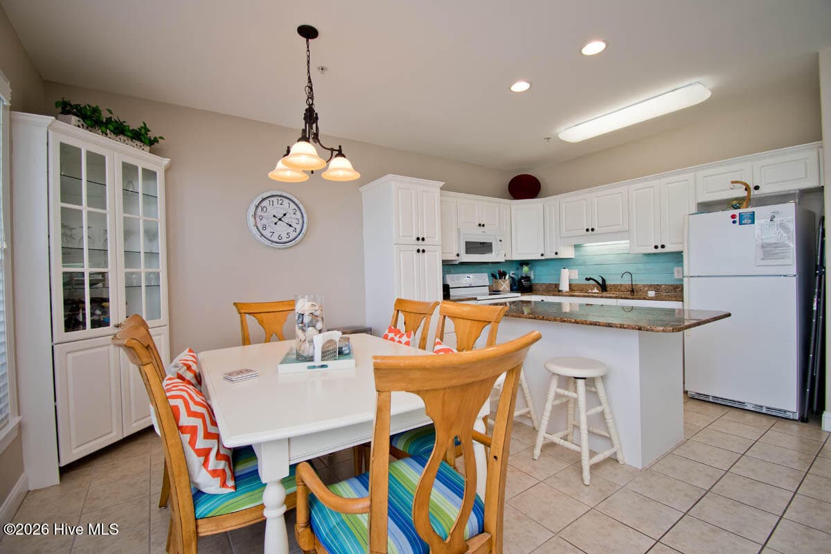 Dining to Kitchen view - 1700 Salter Path Road 202-R, Indian Beach, NC 28512