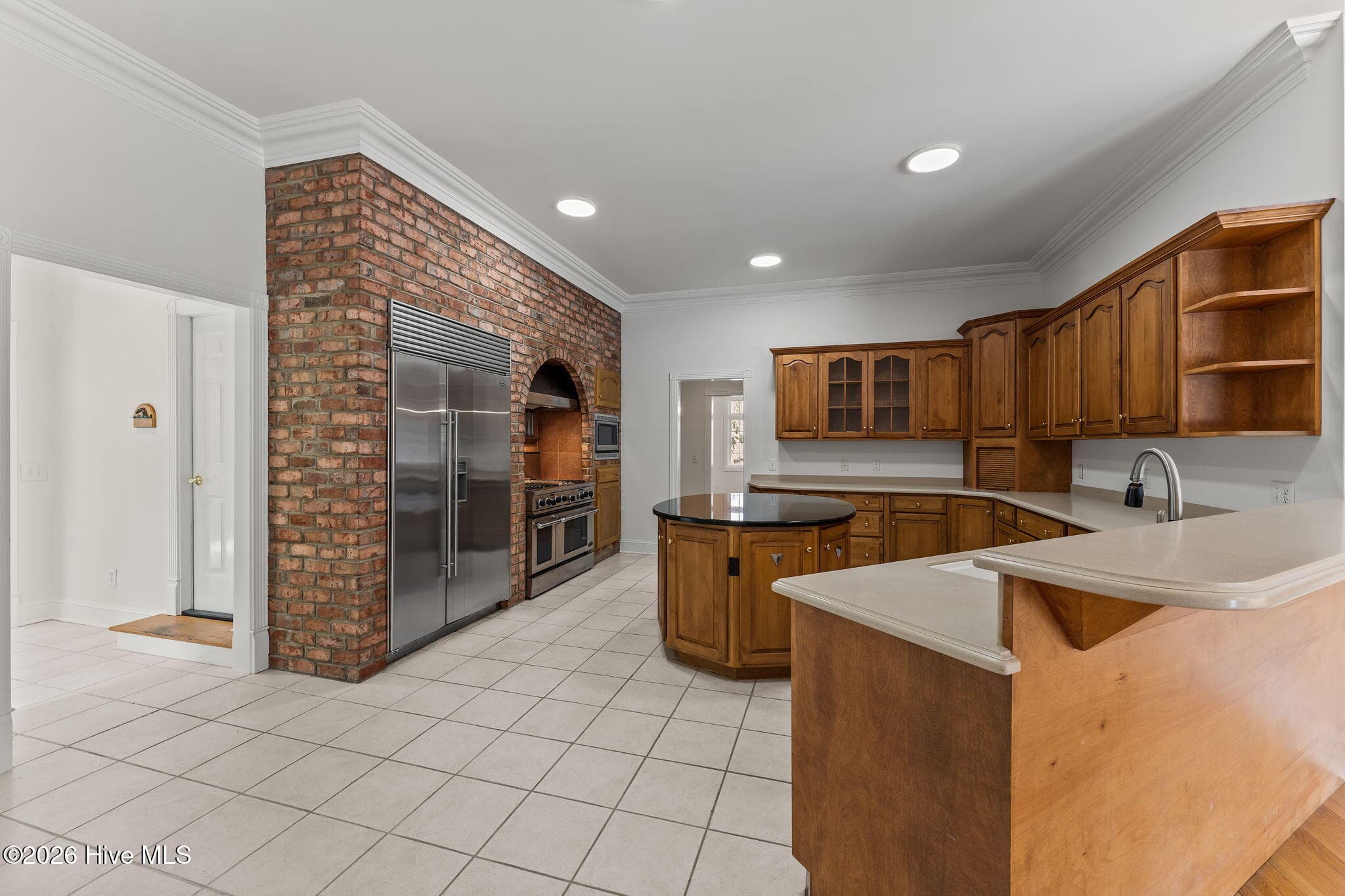 Gourmet kitchen with a DCS gas stove, double oven, beautiful island and lots of work space. - 22 Lochmere Drive, Pinehurst, NC 28374