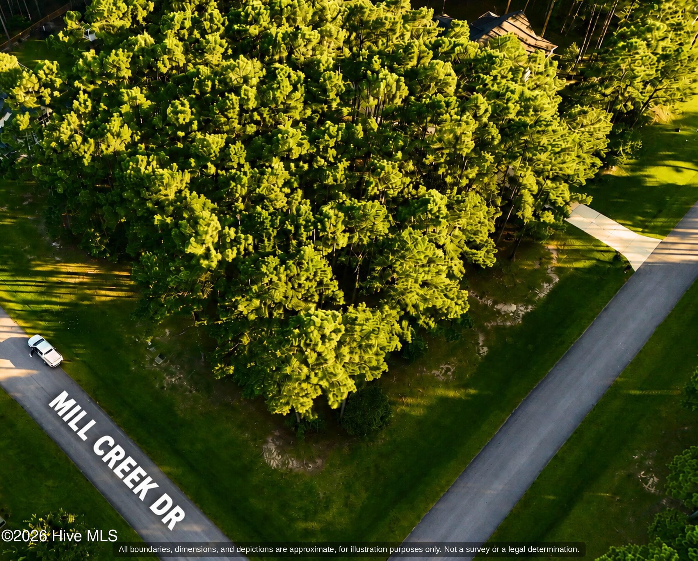 Aerial of the wooded lot along Mill Creek Dr in Arlington Place, Minnesott Beach NC - 0000-0000 LOT 83 Mill Creek Drive, Minnesott Beach, NC 28510