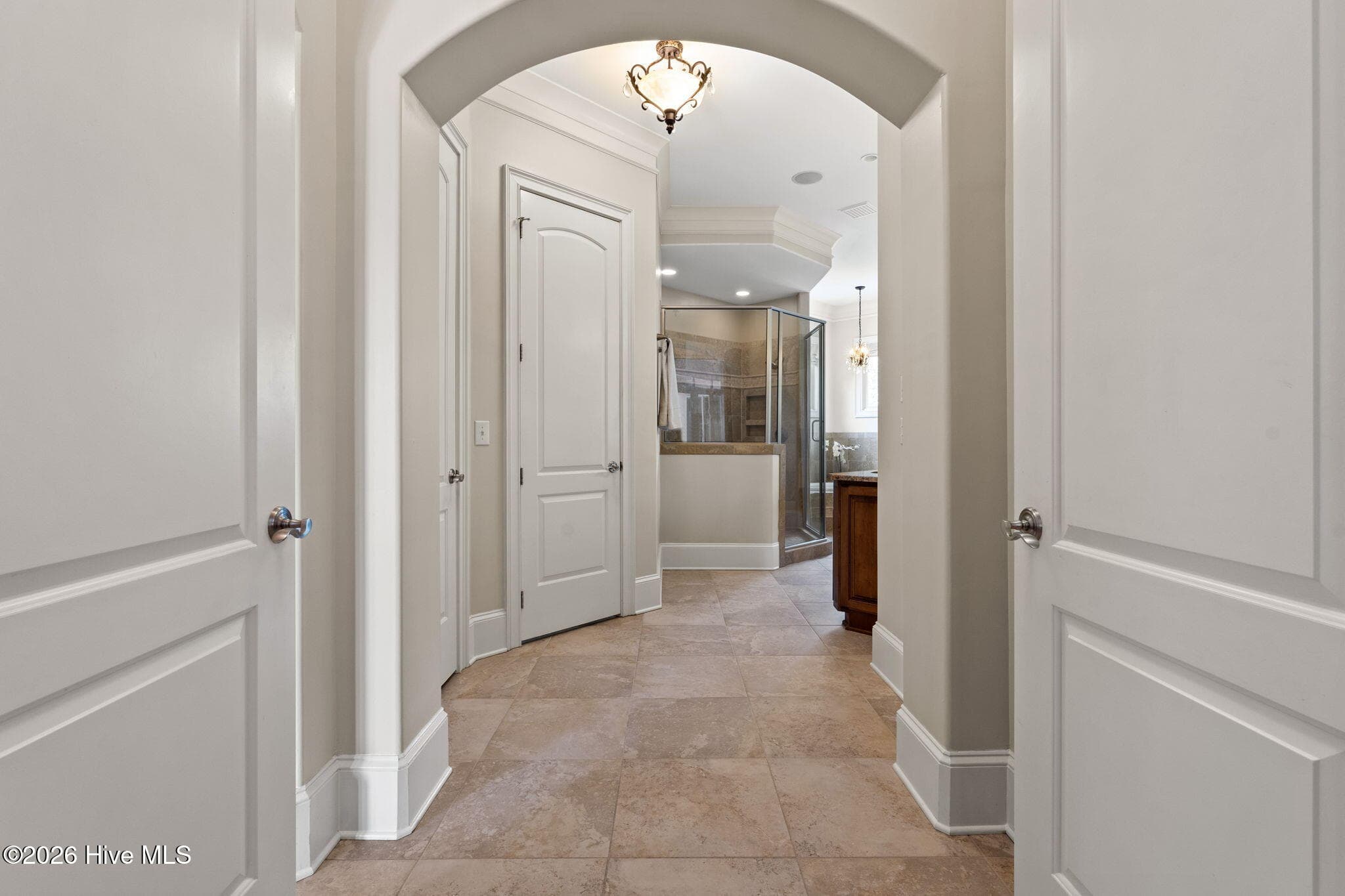 Double doors lead to primary ensuite - 3858 Ridge Crest Drive, Southport, NC 28461