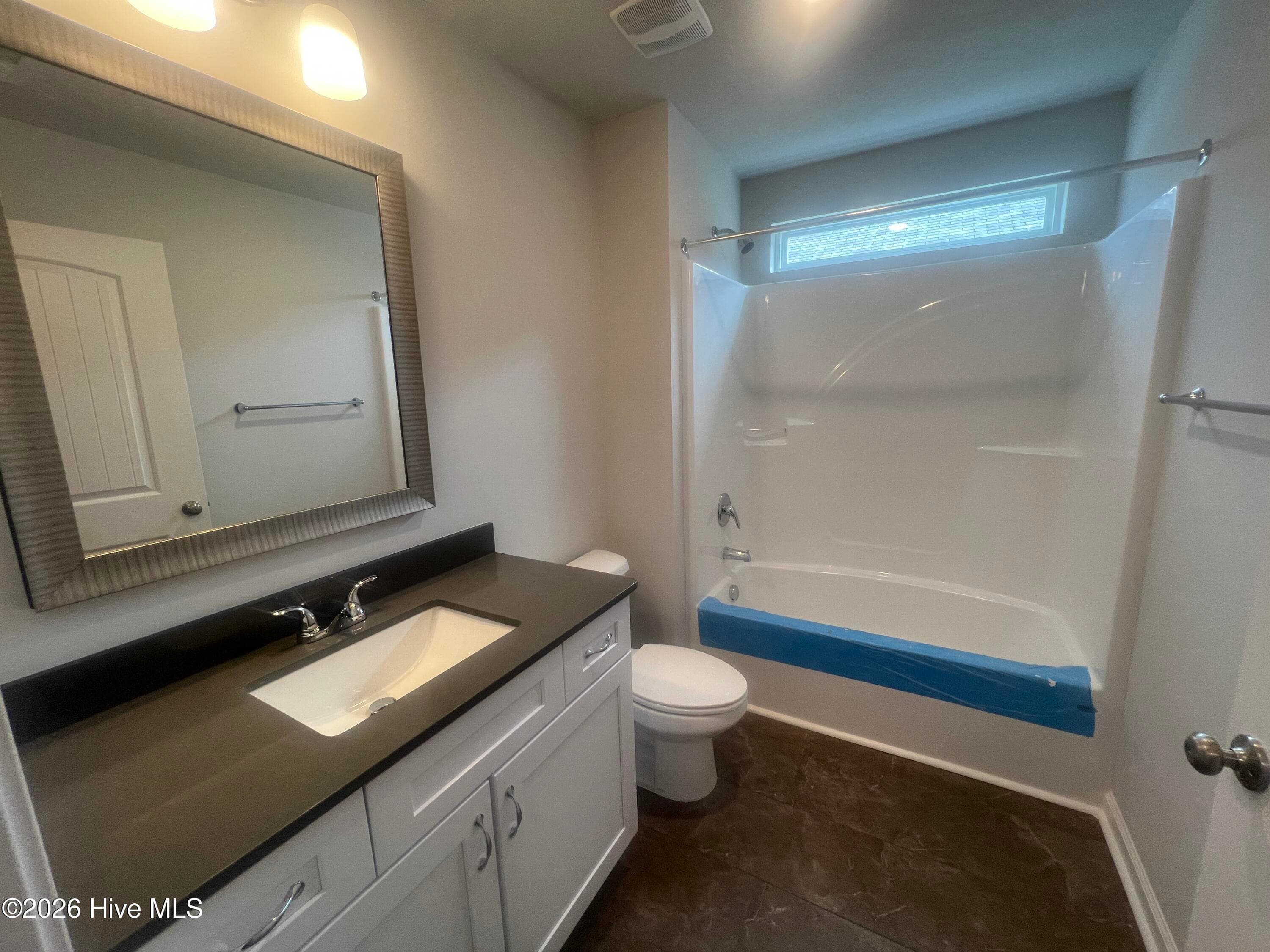 Full guest bath with quartz countertops. - 8887 Snelling Drive, Aiken, SC 29803