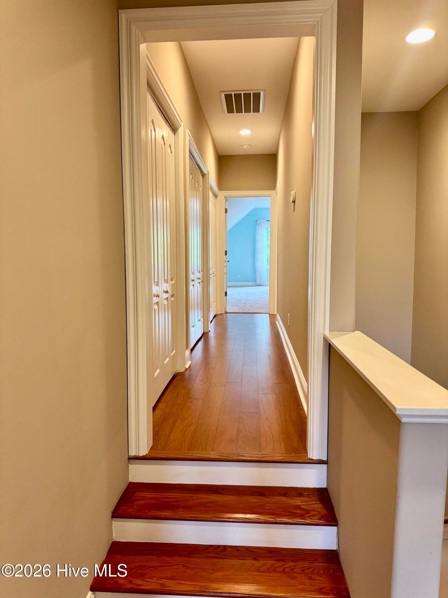 Upstairs hallway with tons of storage - 8812 Maple Ash Trail NE, Leland, NC 28451