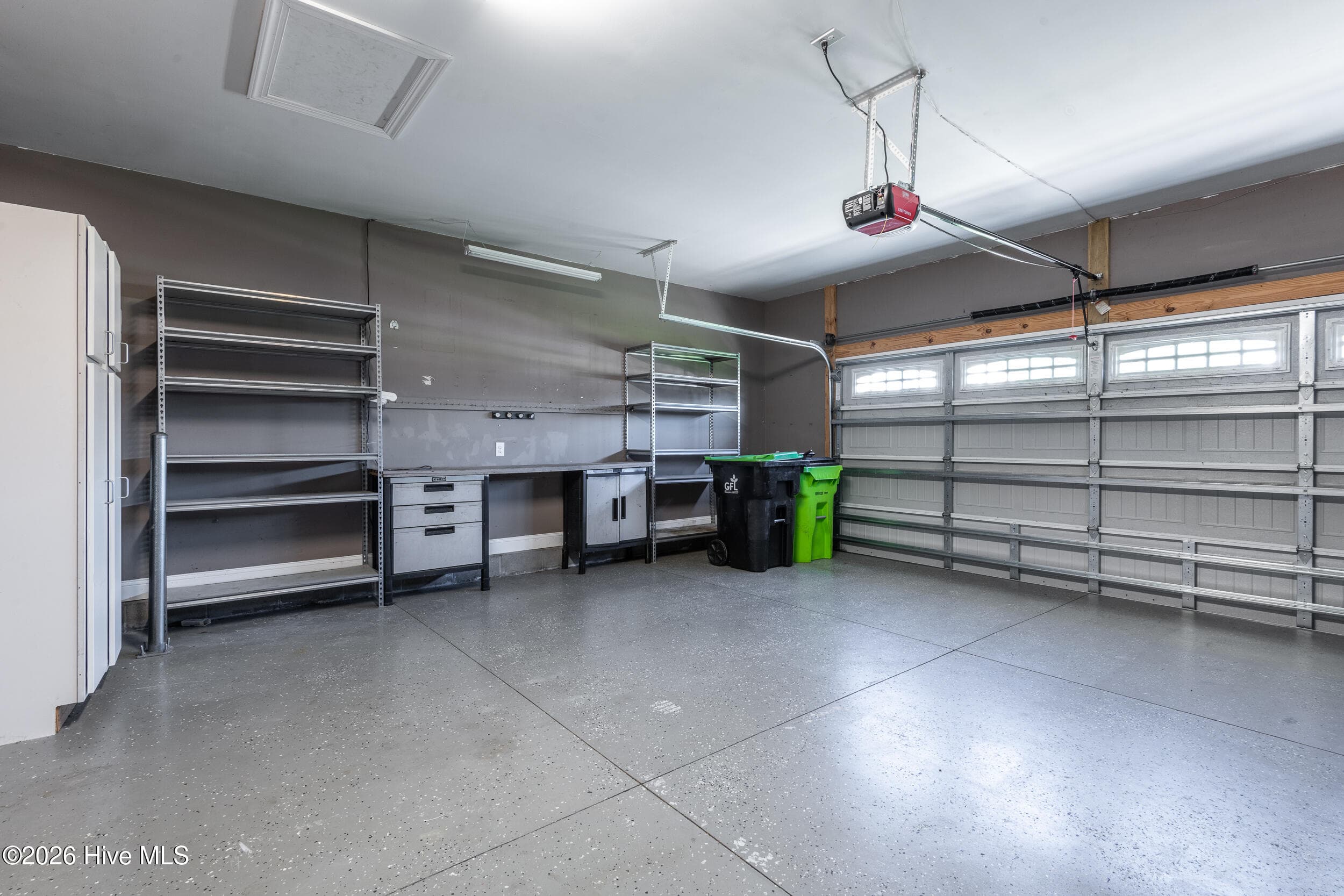 Garage with Steel Shelving - 297 Copper Creek Drive, Winterville, NC 28590