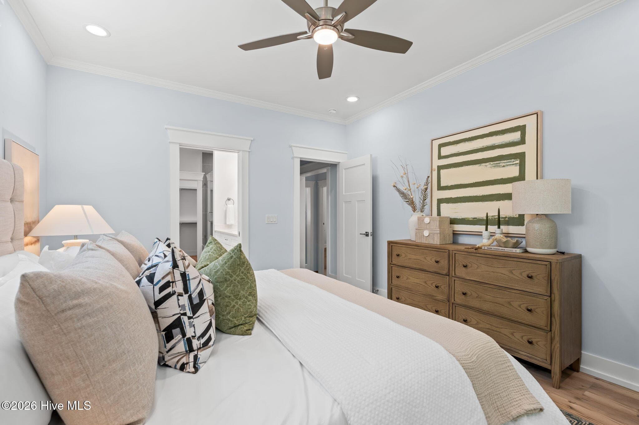 Photos of a staged model of the exact same plan - 312 NE 58th Street, Oak Island, NC 28465