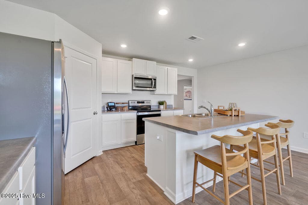 The photos you see here are for illustration purposes only, interior and exterior features, options, colors and selections will vary from the homes as built. - 5322 Areca Road Lot 347, Castle Hayne, NC 28429