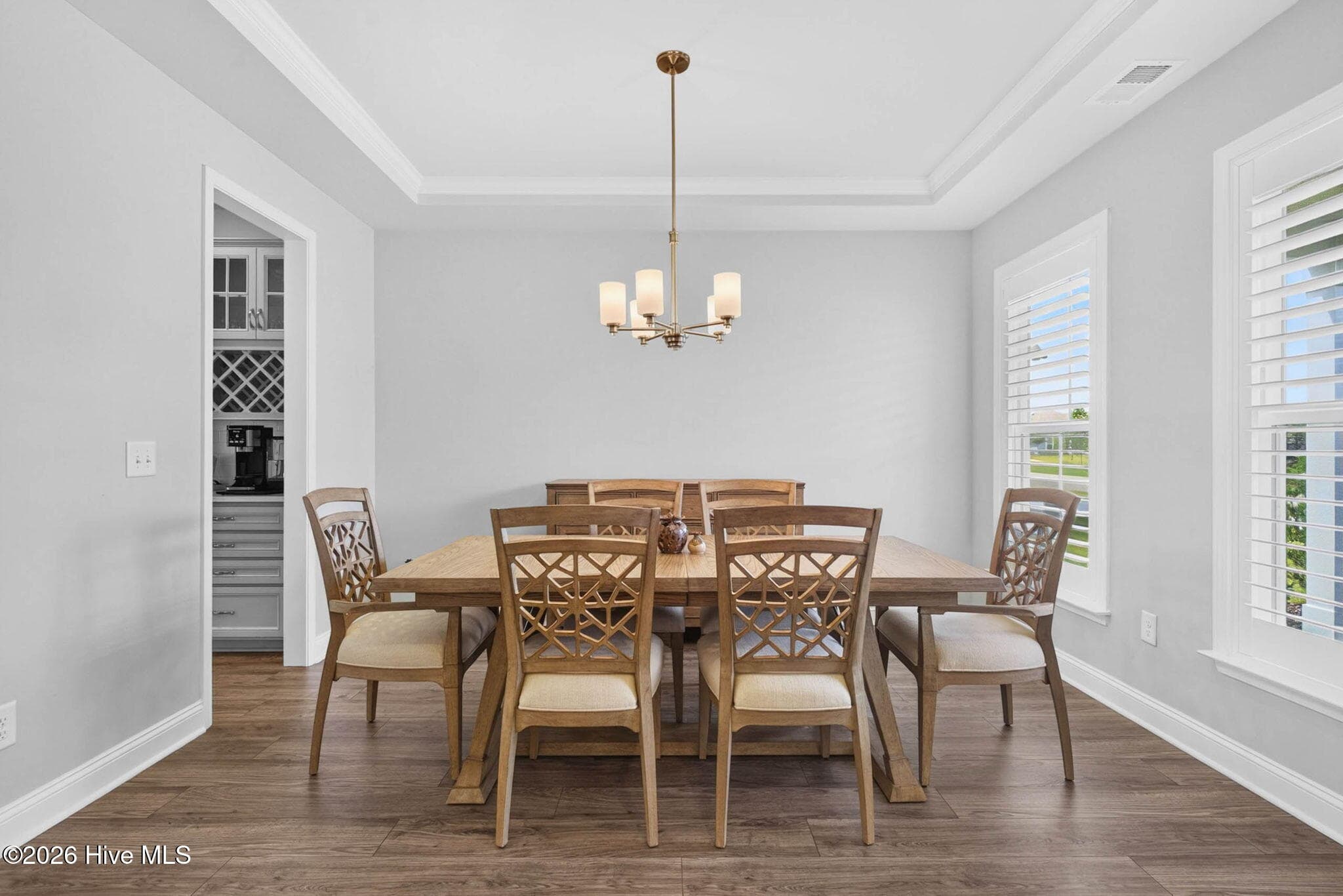 The formal dining room provides an inviting setting for holiday gatherings, dinner parties, and everyday meals. - 139 Eagle Claw Drive, Calabash, NC 28467