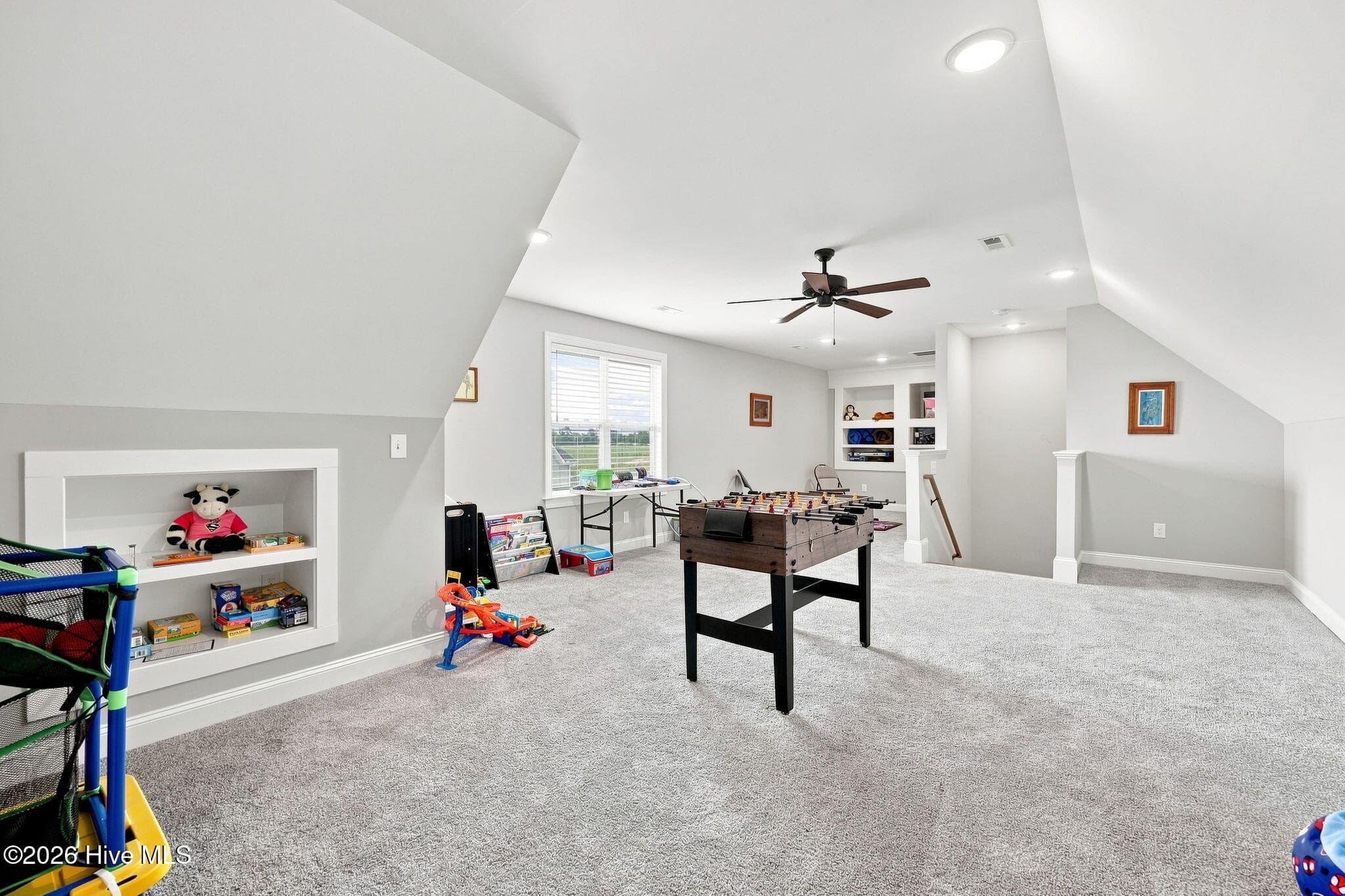 Large bonus room with built-in shelving - 2212 Marinwood Court, Greenville, NC 27834