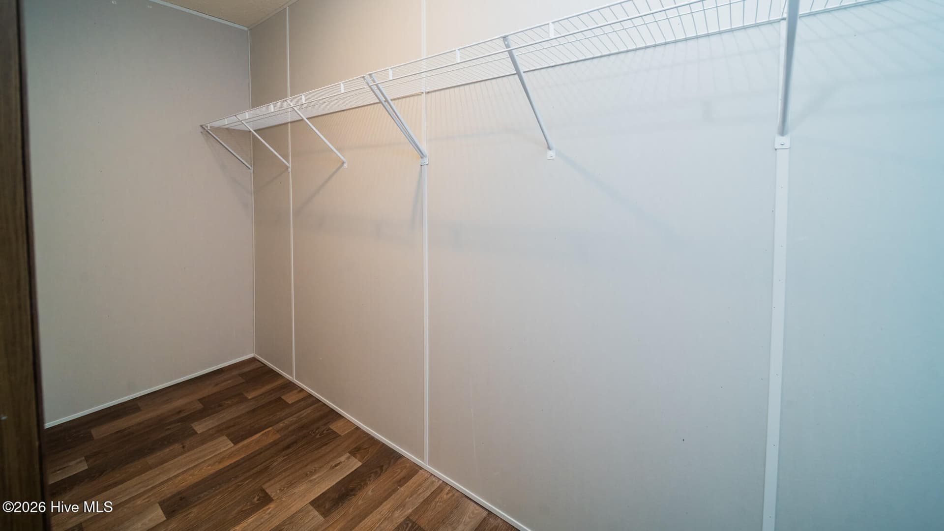 large walking closet in the primary bedroom - 9115 E Calabash Drive SW, Calabash, NC 28467