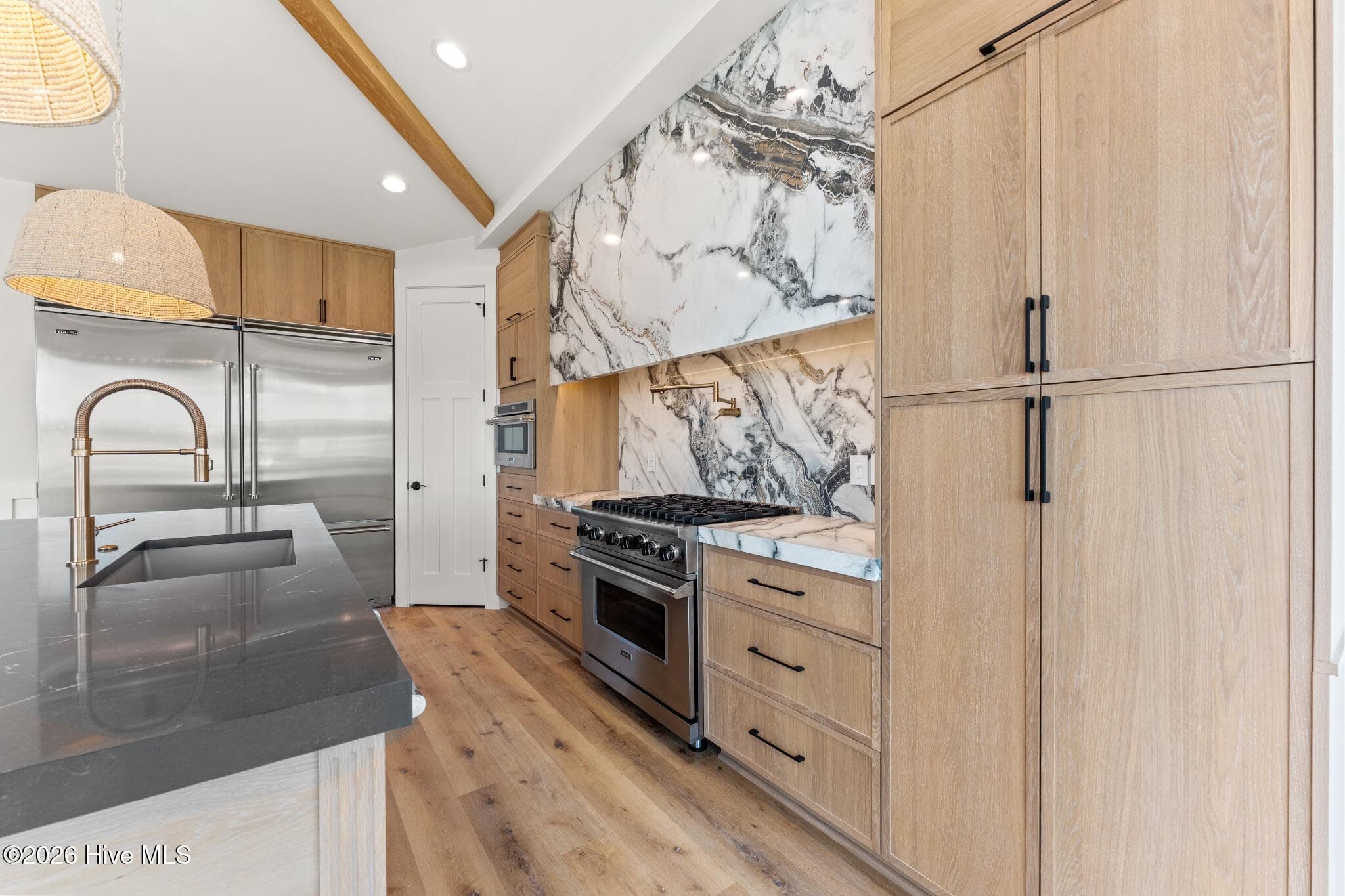 Viking Range & Italian Quartz Backsplash Detail - 41 Grand View Drive, Ocean Isle Beach, NC 28469