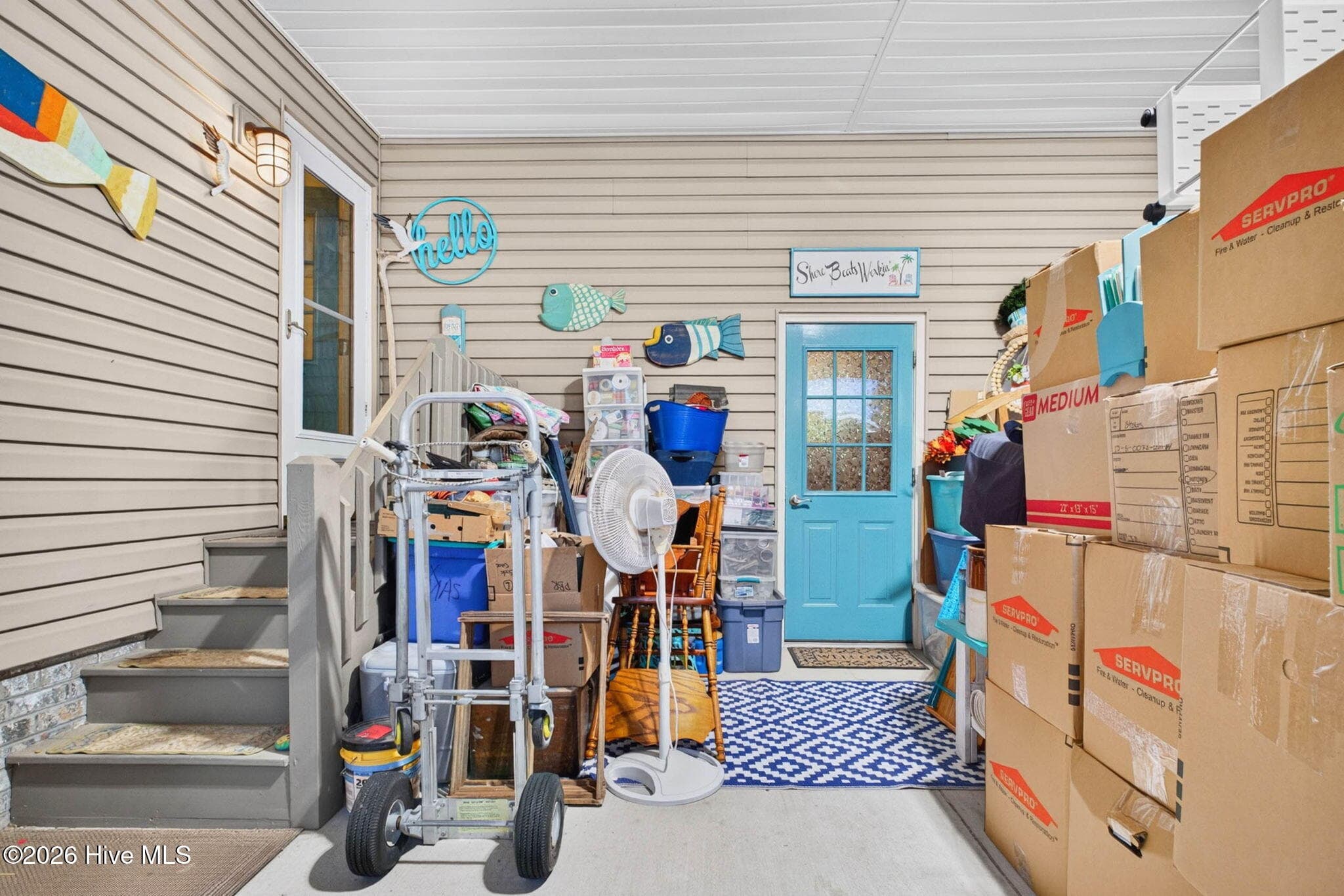 side entrance into garage and viewing entrance to workshop - 449 Deer Path, Calabash, NC 28467
