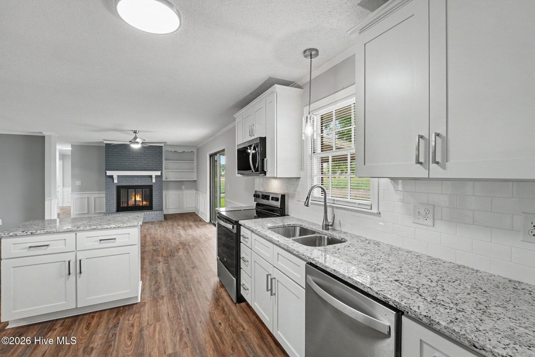 View of kitchen with granite counters - 1900 Wc Braswell Road, Princeton, NC 27569