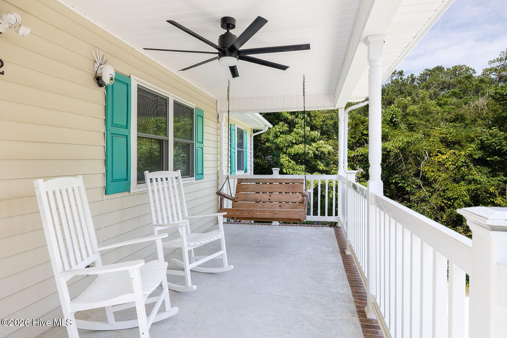The covered front porch is perfect for morning coffee - 122 Purdie Drive, Emerald Isle, NC 28594