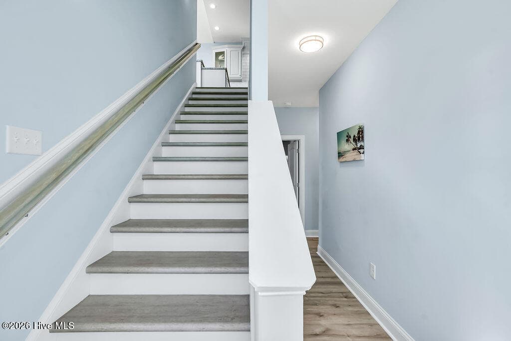 Stairs to 3rd floor & main living area. - 244 Grandview Drive, Sneads Ferry, NC 28460