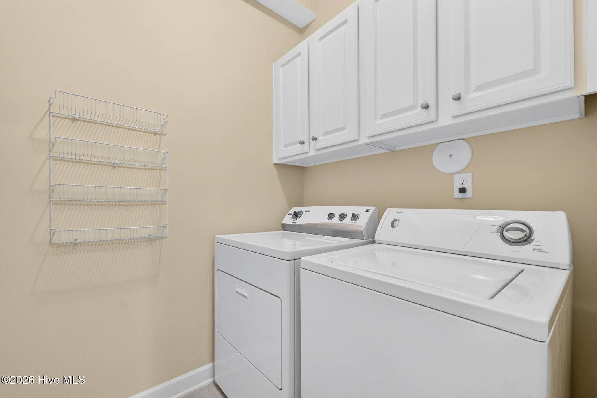 Laundry room by kitchen - 7825 High Market Street #303, Sunset Beach, NC 28468