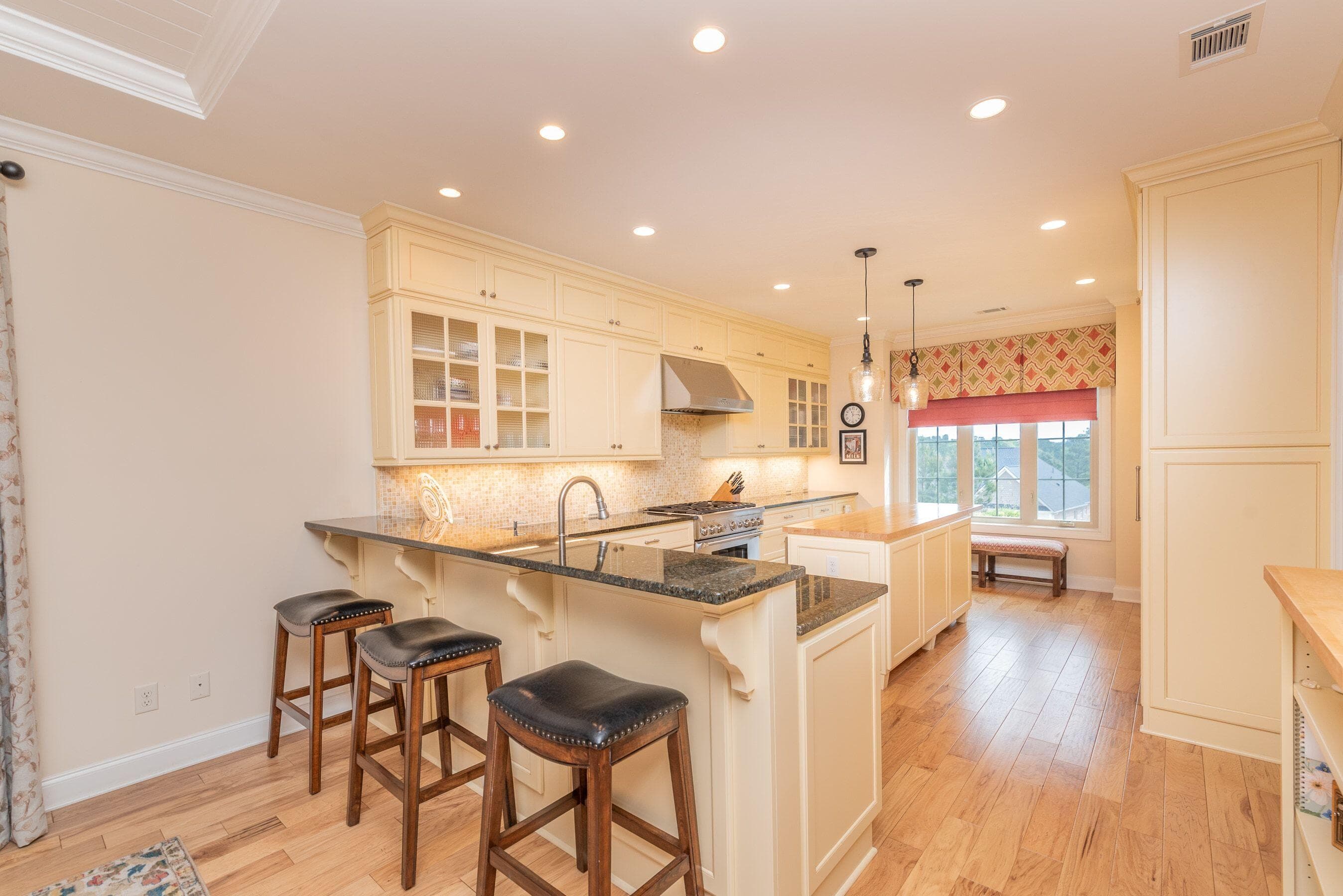 Kitchen snack bar with stools - 207 Quiet Oak Court, Aiken, SC 29803