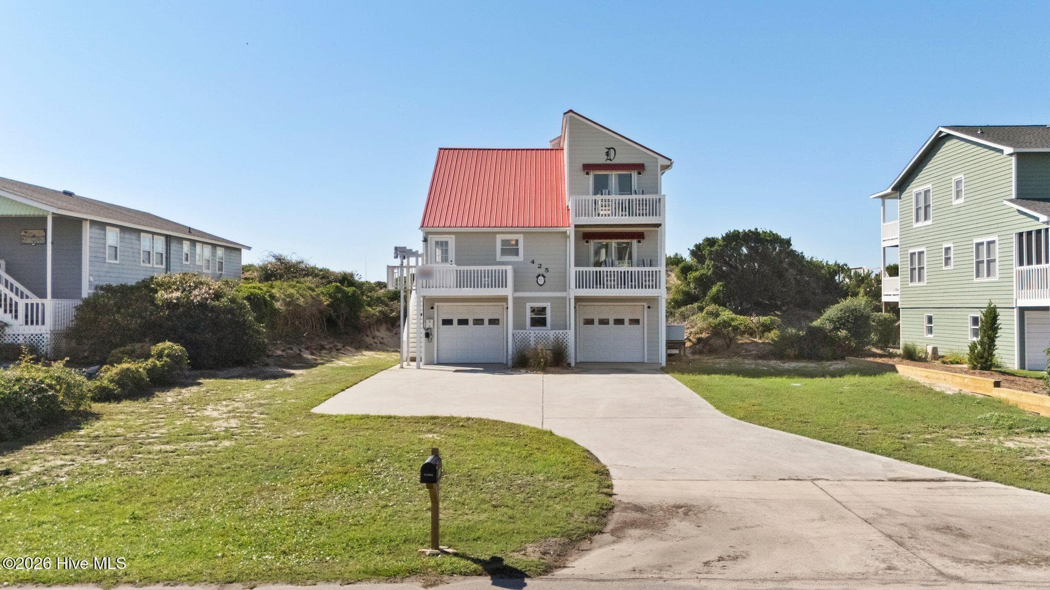 Single Family Residence at 425 Caswell Beach Road, Oak Island, NC 28465, photo 2 of 73